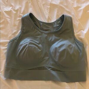 Knix sports bra XL+ with removable cups and mesh front- small stain